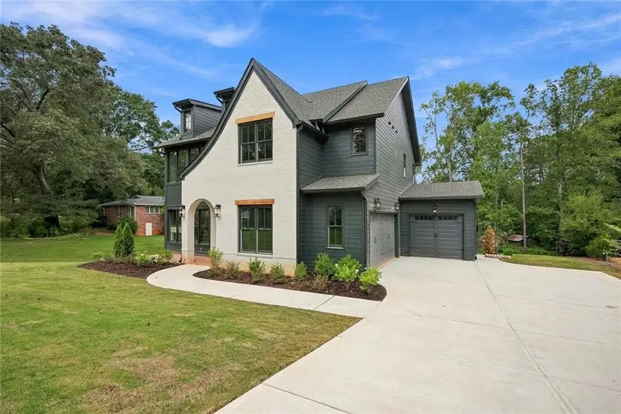 Front exterior of a new home in , Smyrna, GA, highlighting curb appeal (Image 31).