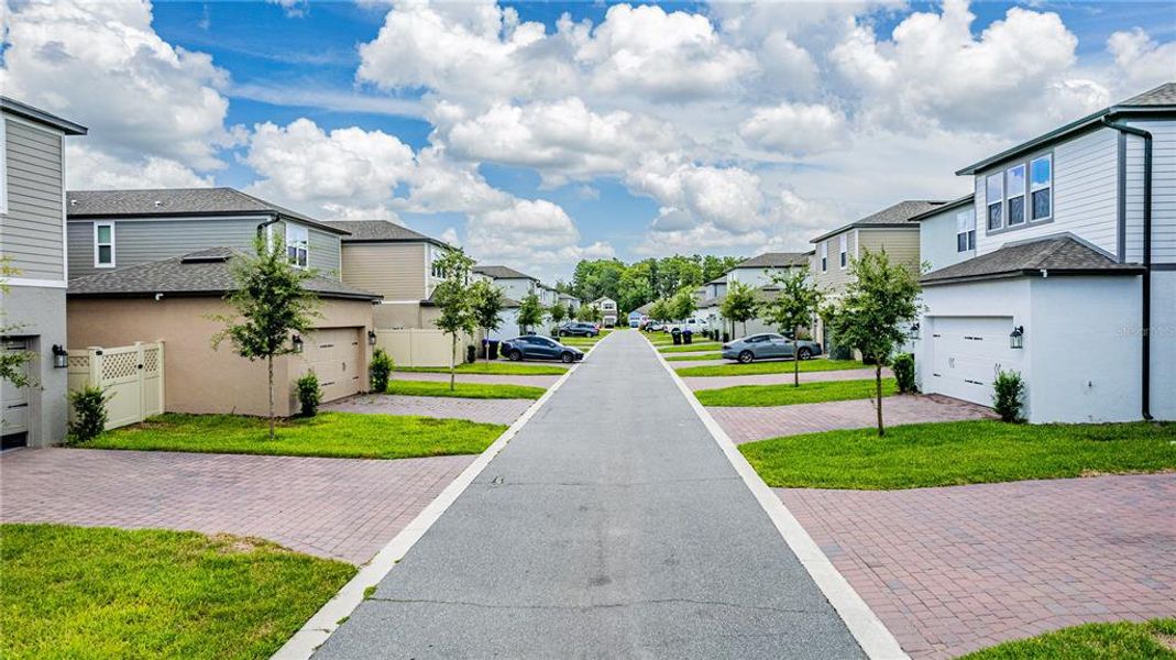 Front exterior of a new home in Encore at Ovation, Winter Garden, FL, highlighting curb appeal (Image 20).
