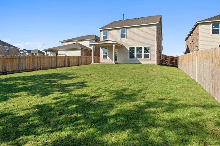 Front exterior of a new home in Salerno - Heritage Collection, Round Rock, TX, highlighting curb appeal (Image 20).