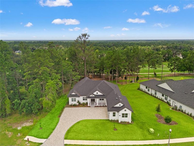Front exterior of a new home in Southern Hills Plantation, Brooksville, FL, highlighting curb appeal (Image 25).