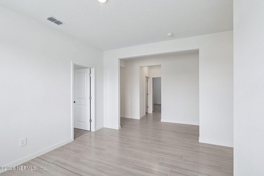 Spacious, unfurnished interior of a new home in Flagler Village - Signature Series, Palm Coast (Image 31).