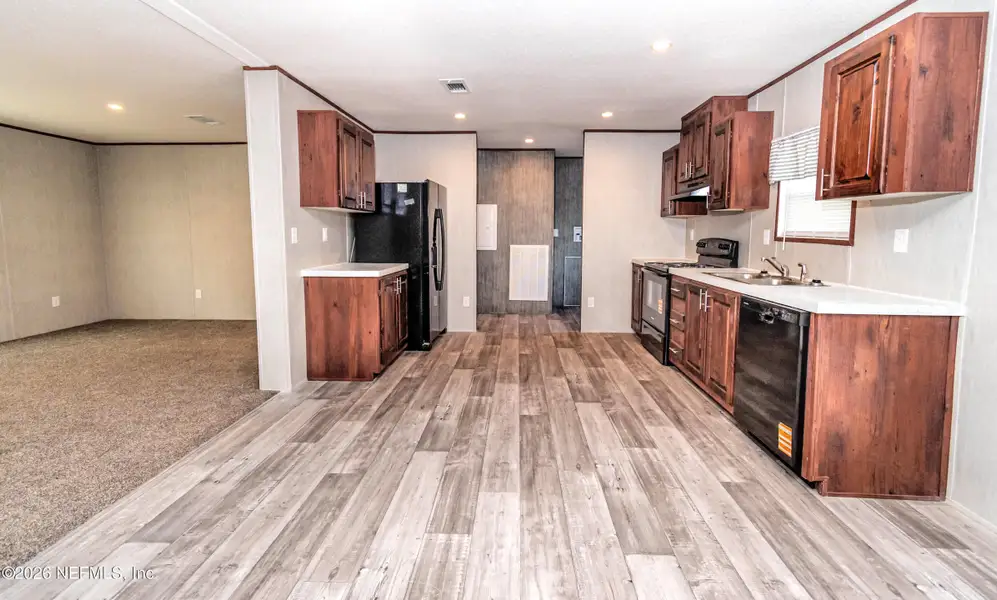 Furnished interior view inside a new home in , Glen St. Mary (Image 5).
