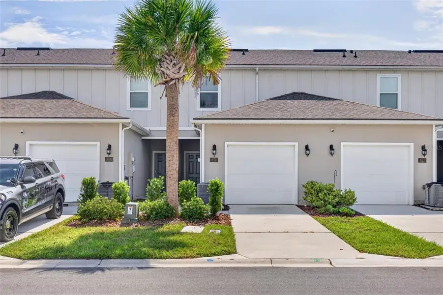 Front exterior of a new home in , Middleburg, FL, highlighting curb appeal (Image 1). Front exterior of a new home in , Middleburg, FL, highlighting curb appeal (Image 1).