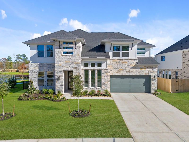 Front exterior of a new home in , Spring, TX, highlighting curb appeal (Image 23).