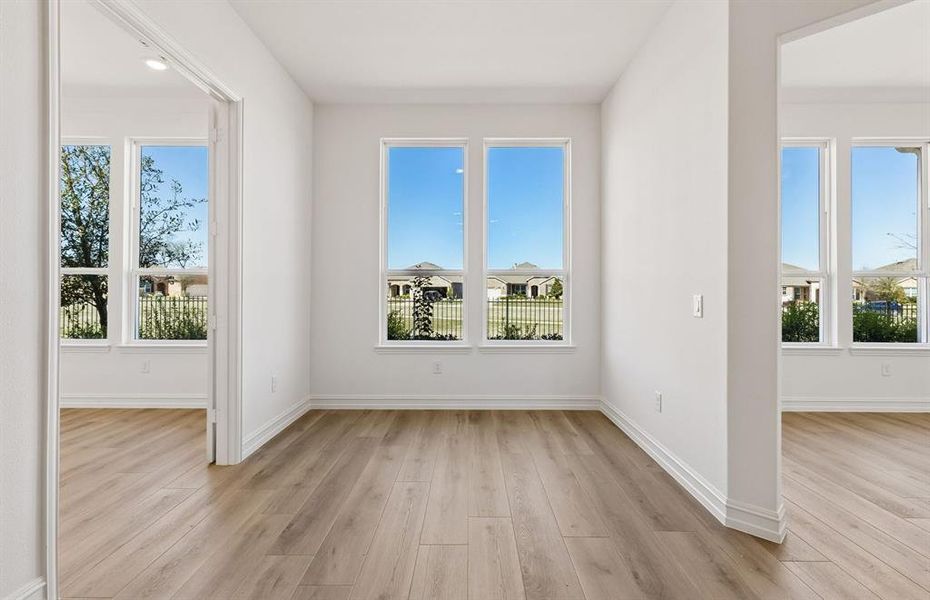 Sunroom, hearth room, and study