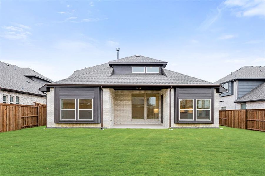 Exterior details and patio area of a home in Windsong Ranch Classic 61, Prosper (Image 4).