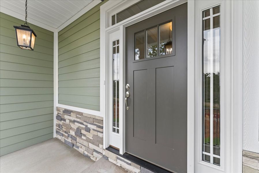 Representative exterior details of a home built from the Roosevelt Elite by Enchanted Homes in Lakeside at Blue Ridge Plantation, Taylors (Image 23). Representative exterior details of a home built from the Roosevelt Elite by Enchanted Homes in Lakeside at Blue Ridge Plantation, Taylors (Image 23).