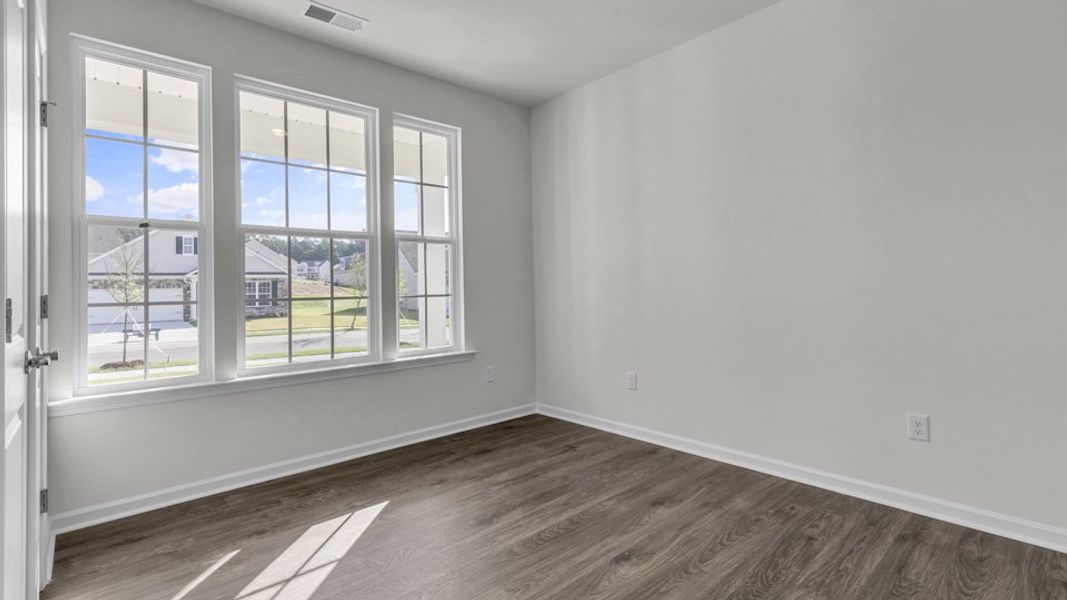 Representative unfurnished interior of a home built from the CLIFTON by D.R. Horton in The Villas at Galvins Ridge, Sanford (Image 12). Representative unfurnished interior of a home built from the CLIFTON by D.R. Horton in The Villas at Galvins Ridge, Sanford (Image 12).