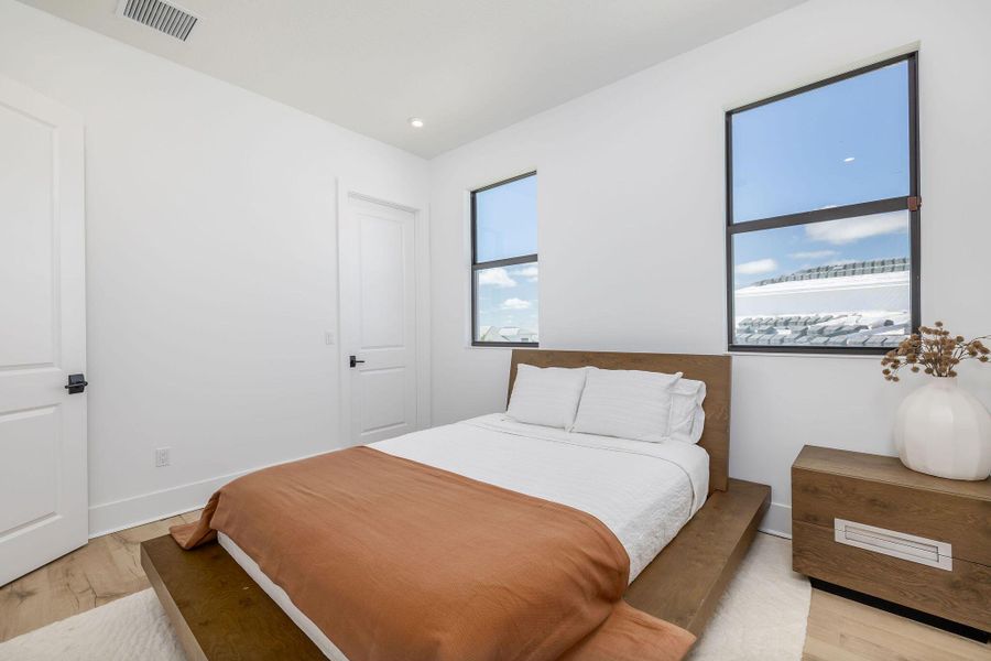 Furnished interior view inside a new home in , Port St. Lucie (Image 40).