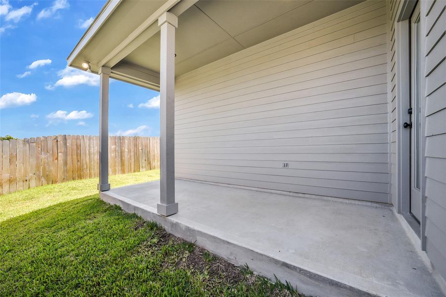 Exterior details and patio area of a home in Mostyn Springs, Magnolia (Image 1). Exterior details and patio area of a home in Mostyn Springs, Magnolia (Image 1).