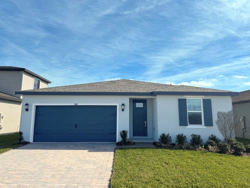 Front exterior of a new home in Two Rivers - Classic Series, Zephyrhills, FL, highlighting curb appeal (Image 1).