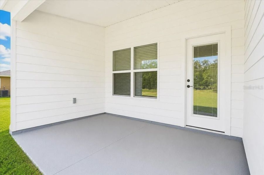 Exterior details and patio area of a home in Country Way South, Newberry (Image 4).