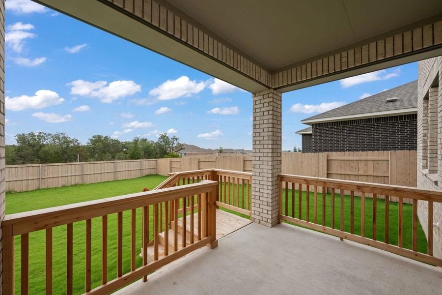 Exterior details and patio area of a home in The Colony, Bastrop (Image 3).