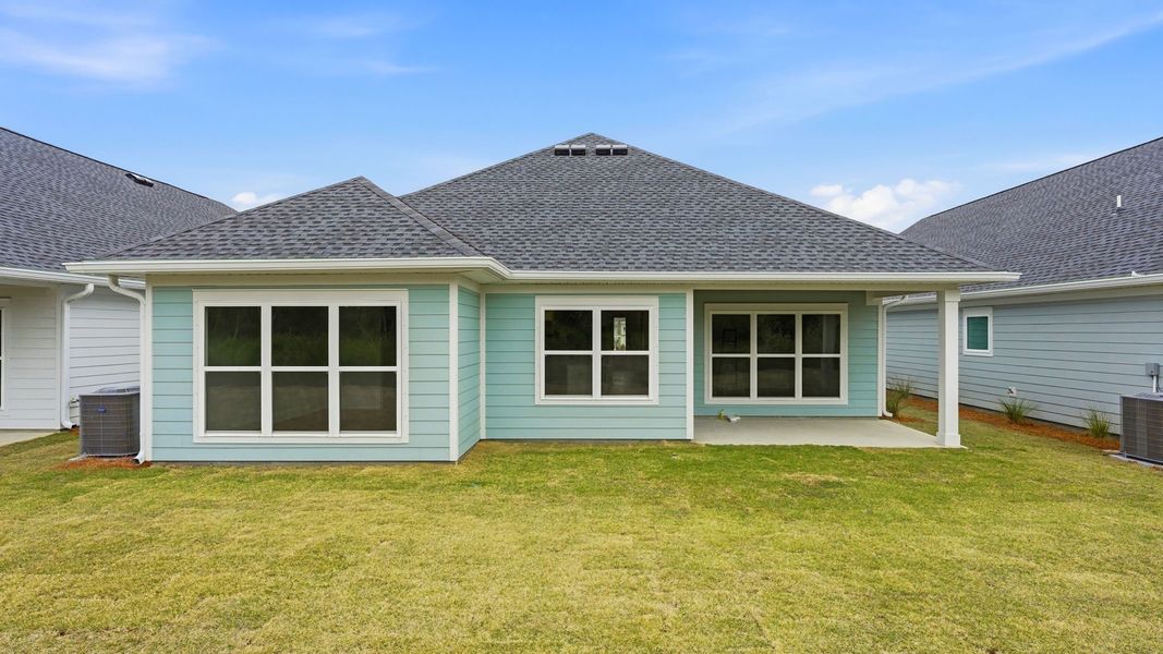Exterior details and patio area of a home in Breakfast Point East Phase II, Panama City Beach (Image 3).