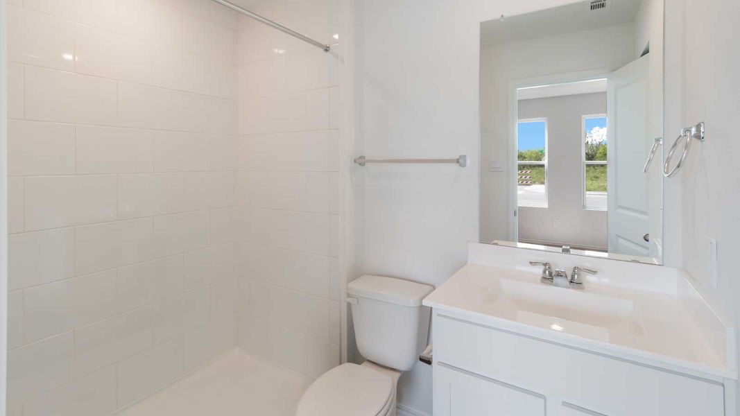 Representative furnished interior of a home built from the The Dahlia by D.R. Horton in Marigold, Kyle (Image 5).