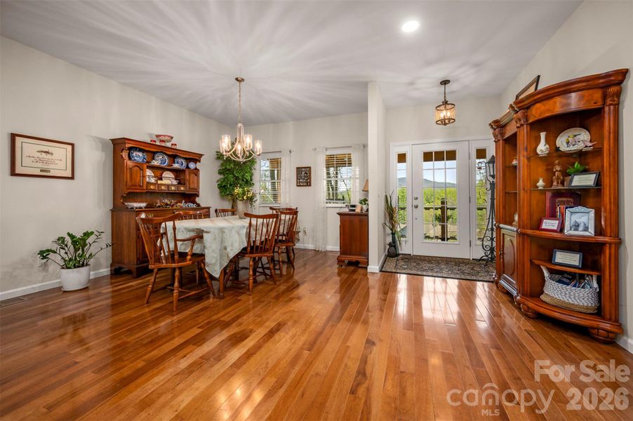 Great room with living/dining combo and entry onto the front porch. Great room with living/dining combo and entry onto the front porch.