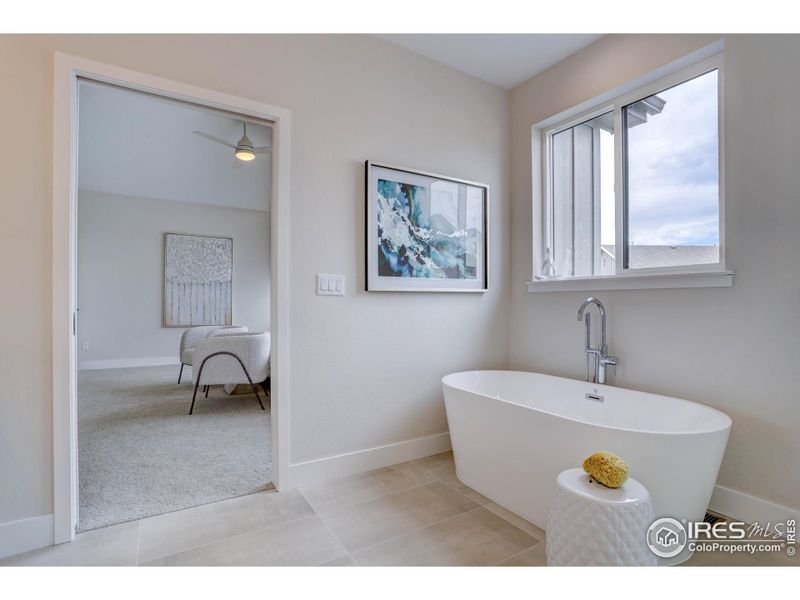 Soaker tub in primary bathroom