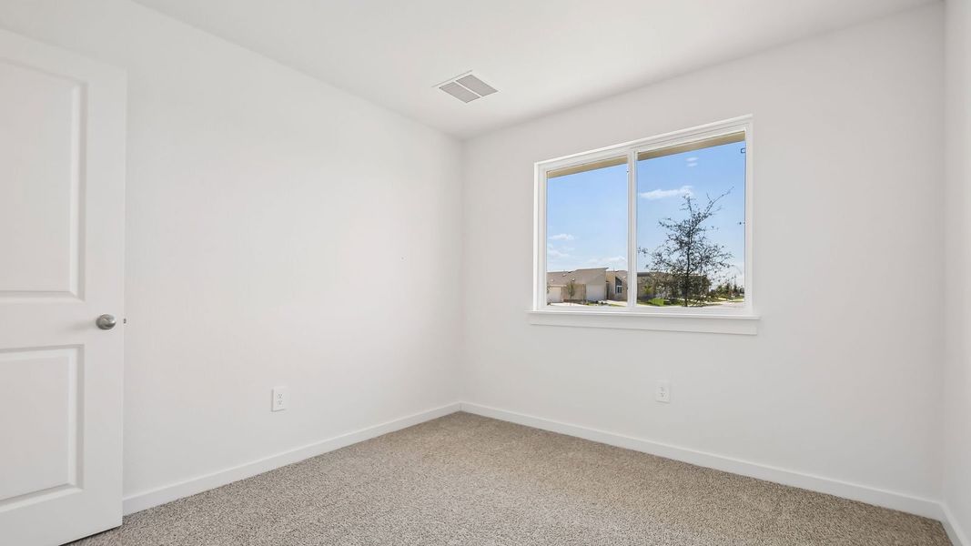 Spacious, unfurnished interior of a new home in Trails at Wildhorse, Austin (Image 34).