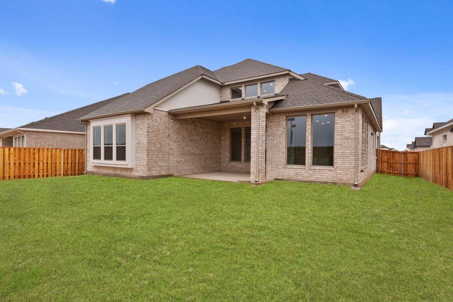 Rear of Home and Private Backyard