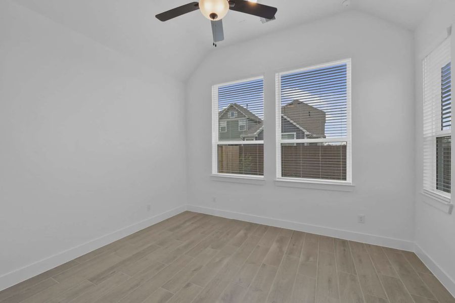 Representative unfurnished interior of a home built from the Versailles by Chesmar Homes in Meridiana Chateau, Manvel (Image 41).