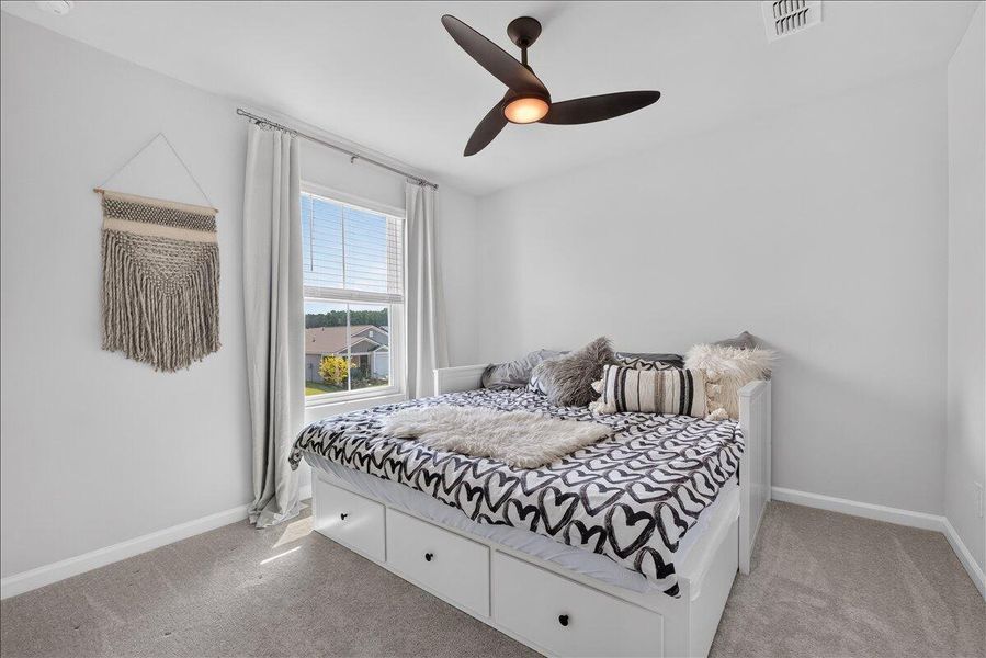 Furnished interior view inside a new home in Sanctuary Cove at Cane Bay, Summerville (Image 28).