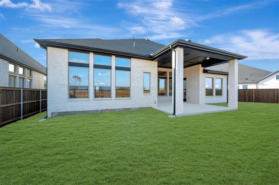 Exterior details and patio area of a home in The Ridge at Northlake, Northlake (Image 3).