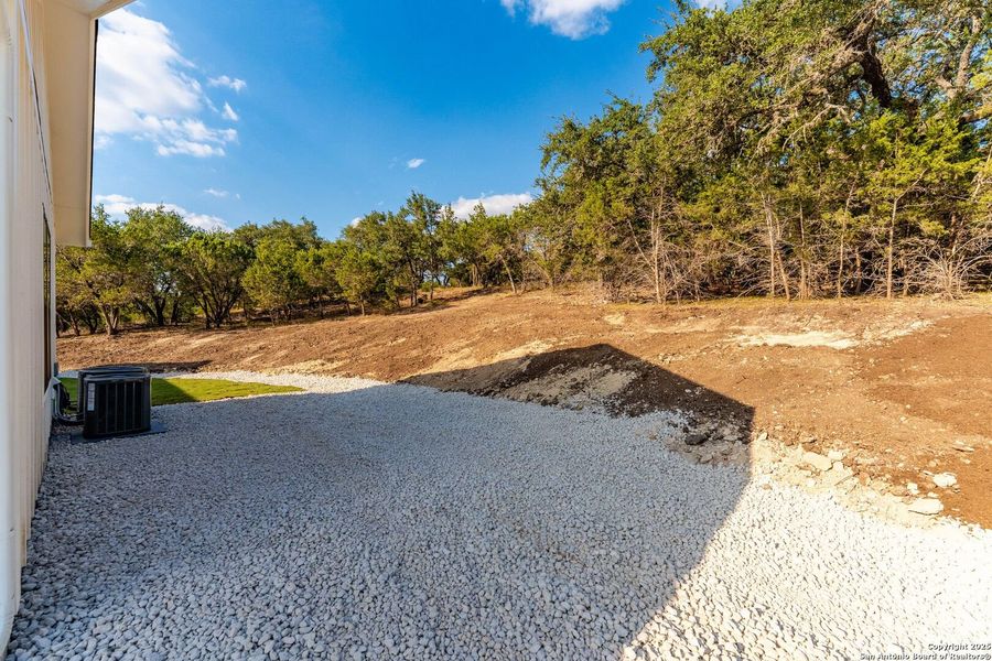 Exterior details and patio area of a home in , Boerne (Image 32).