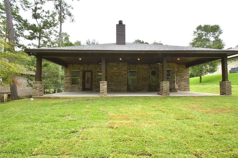 Front exterior of a new home in , Huntsville, TX, highlighting curb appeal (Image 16). Front exterior of a new home in , Huntsville, TX, highlighting curb appeal (Image 16).