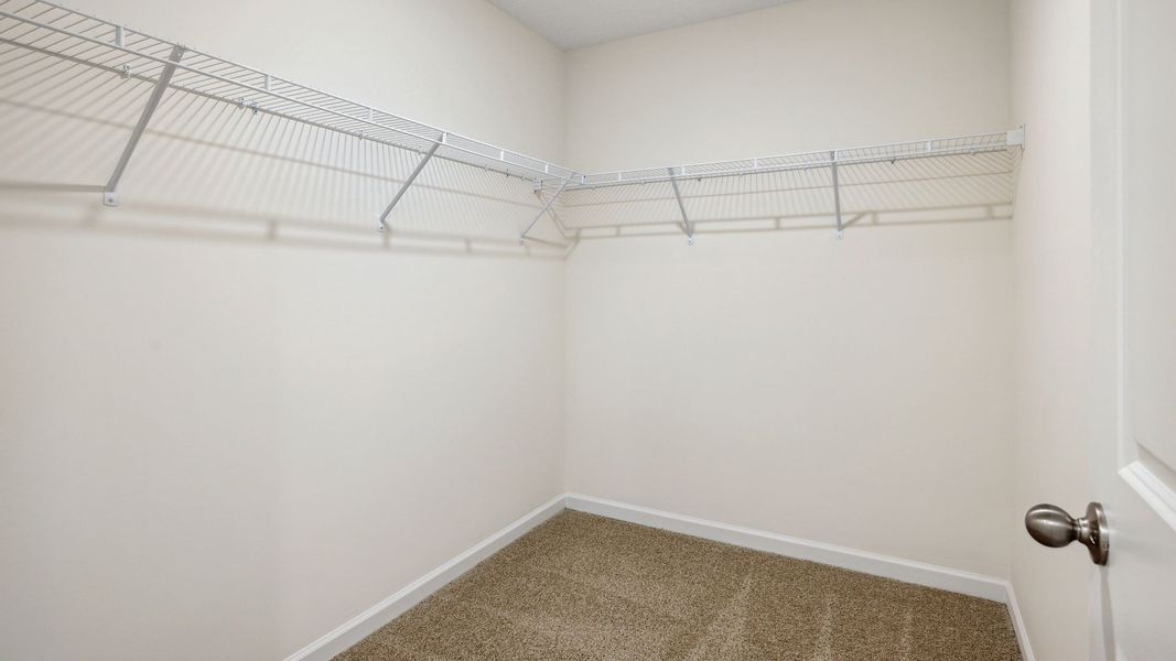 Representative unfurnished interior of a home built from the Bennet by D.R. Horton in The Hideaway at Fox Meadows, Bluff City (Image 19).