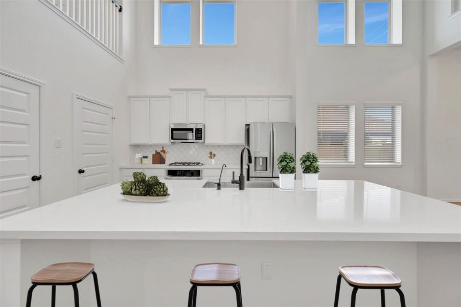 Chef-worthy island kitchen (*Photo not of actual home and used for illustration purposes only.)