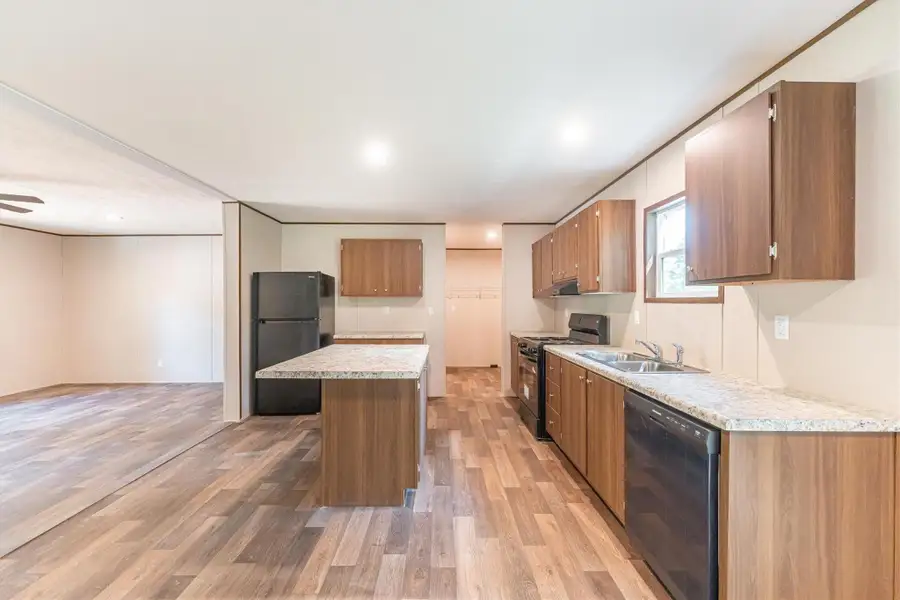 Furnished interior view inside a new home in , Conroe (Image 9).