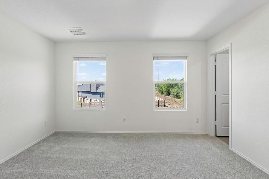 Spacious, unfurnished interior of a new home in Plum Creek North: Stonehill Collection, Kyle (Image 12).