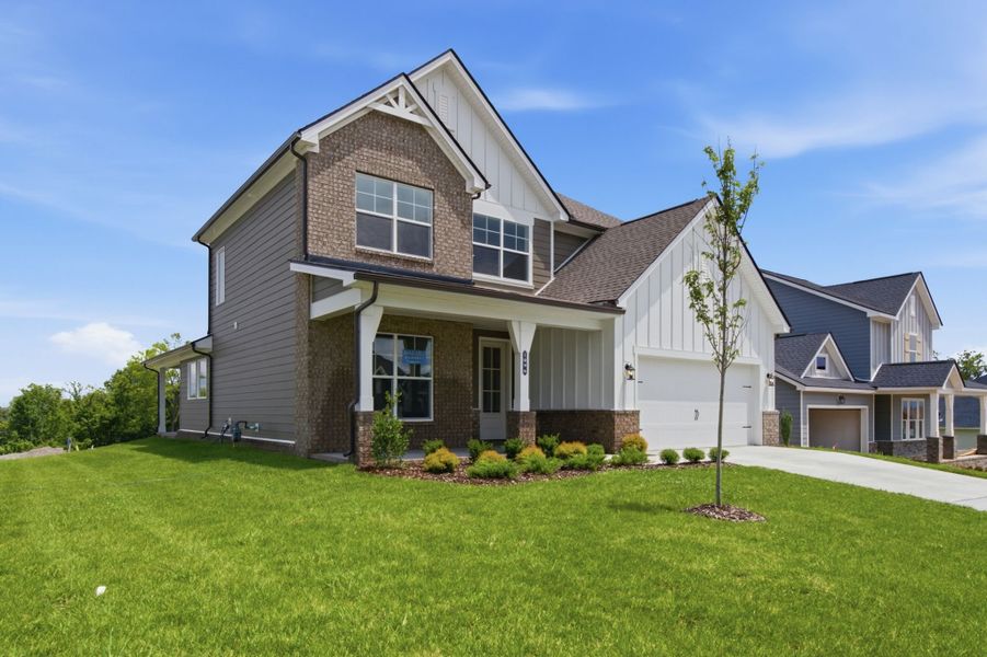Front exterior of a new home in The Preserve at Five Oaks, Lebanon, TN, highlighting curb appeal (Image 2).