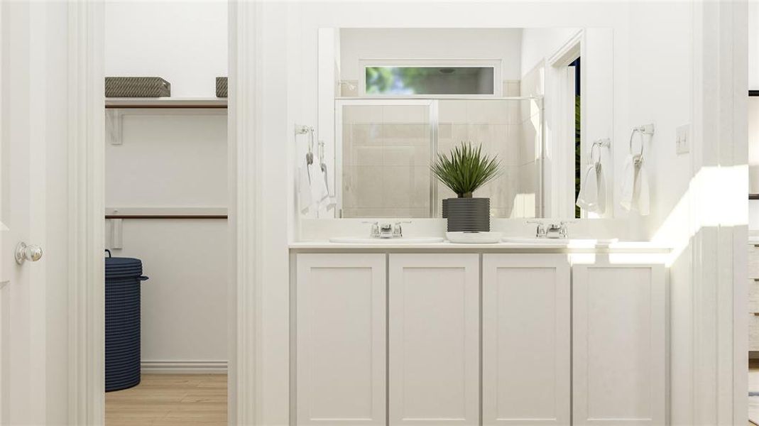 Bathroom with vanity, wood-type flooring, and a shower with shower door