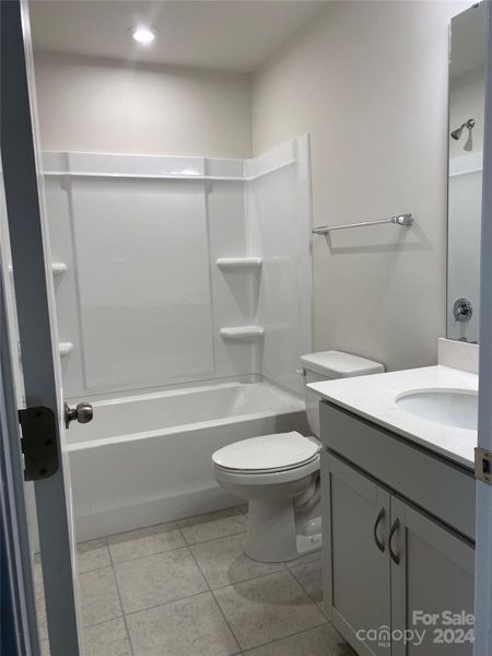 3rd Floor Hall Bath has Ceramic Tile Floors and Linen Closet