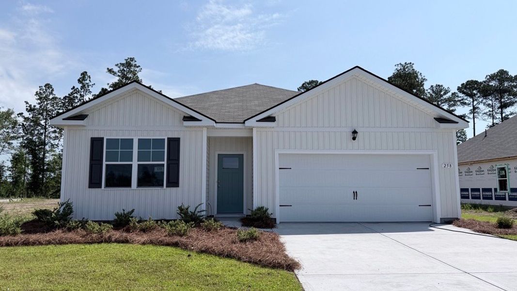 Front exterior of a new home in Preserve at Cypress Commons, Conway, SC, highlighting curb appeal (Image 1). Front exterior of a new home in Preserve at Cypress Commons, Conway, SC, highlighting curb appeal (Image 1).