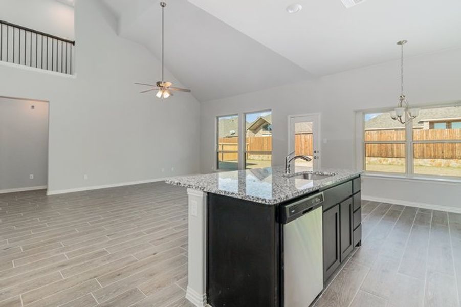 Furnished interior view inside a new home in Mustang Place II, Heartland (Image 9).