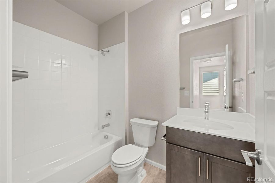 Furnished interior view inside a new home in Painted Prairie, Aurora (Image 10).