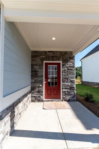Front exterior of a new home in , Dawsonville, GA, highlighting curb appeal (Image 1).