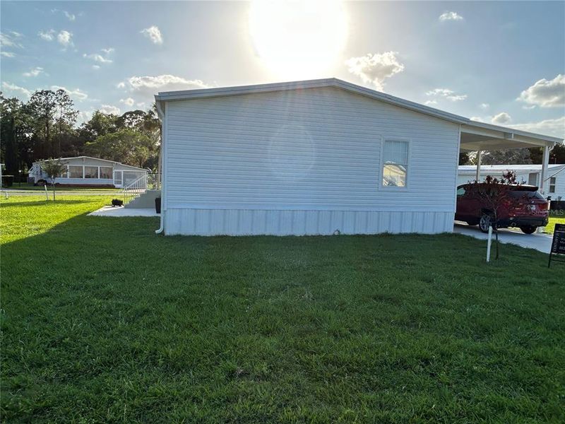 Exterior details and patio area of a home in , Lake Placid (Image 14).