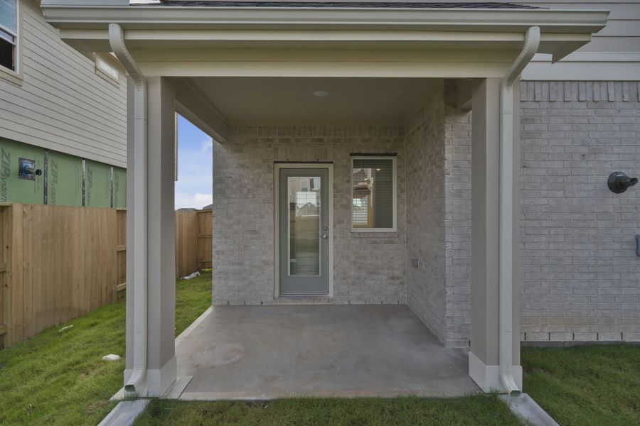 Representative exterior details of a home built from the Riverdale by Chesmar Homes in Meridiana Courtyard Collection, Manvel (Image 4).