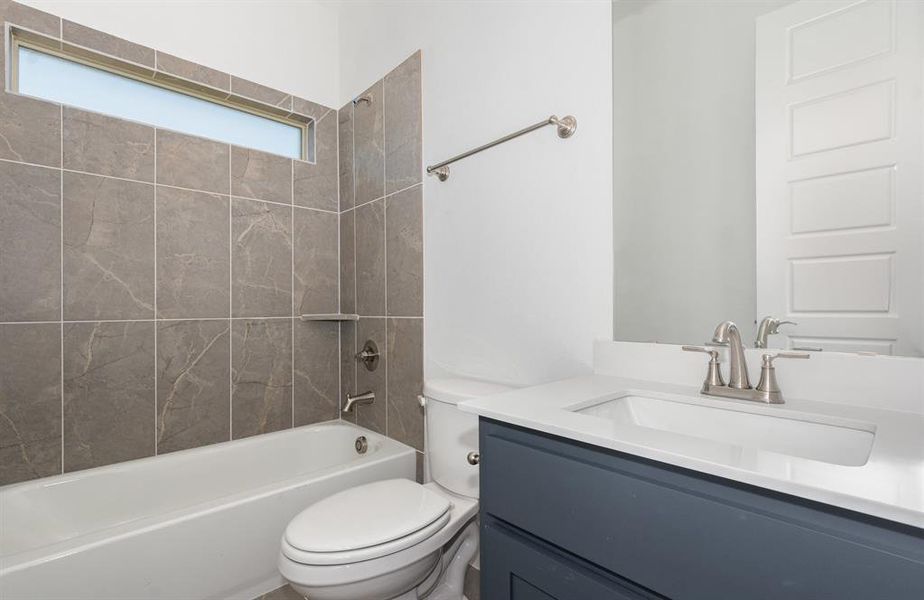 Furnished interior view inside a new home in Stone Henge II, Sanger (Image 10).