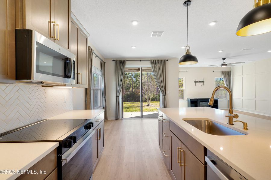 Furnished interior view inside a new home in Seminole Palms Single-Family Homes, Palm Coast (Image 16).