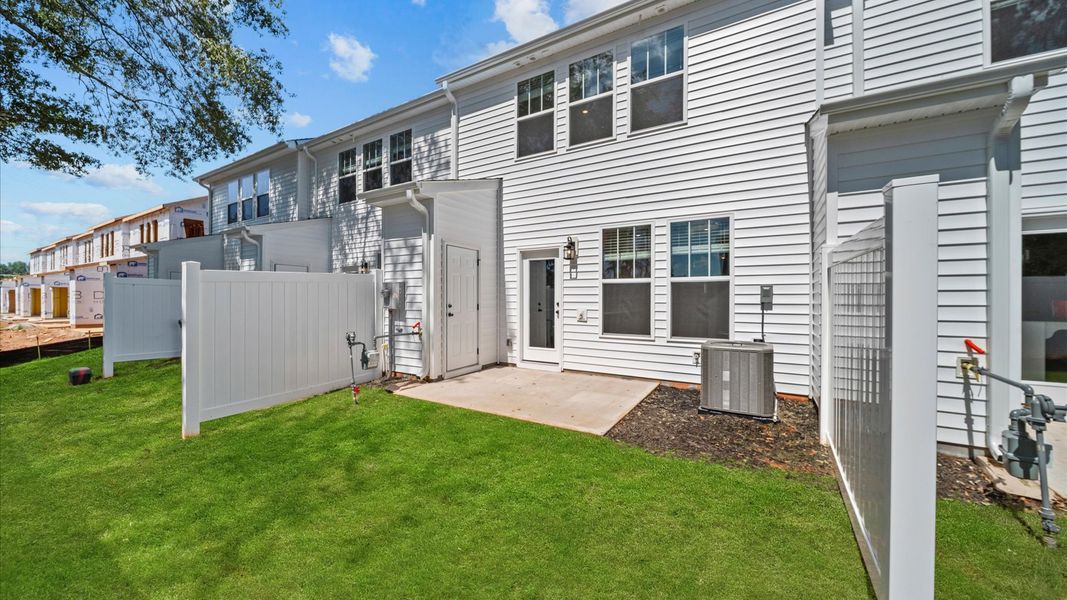 Front exterior of a new home in Hickory Heights, Greenville, SC, highlighting curb appeal (Image 21). Front exterior of a new home in Hickory Heights, Greenville, SC, highlighting curb appeal (Image 21).