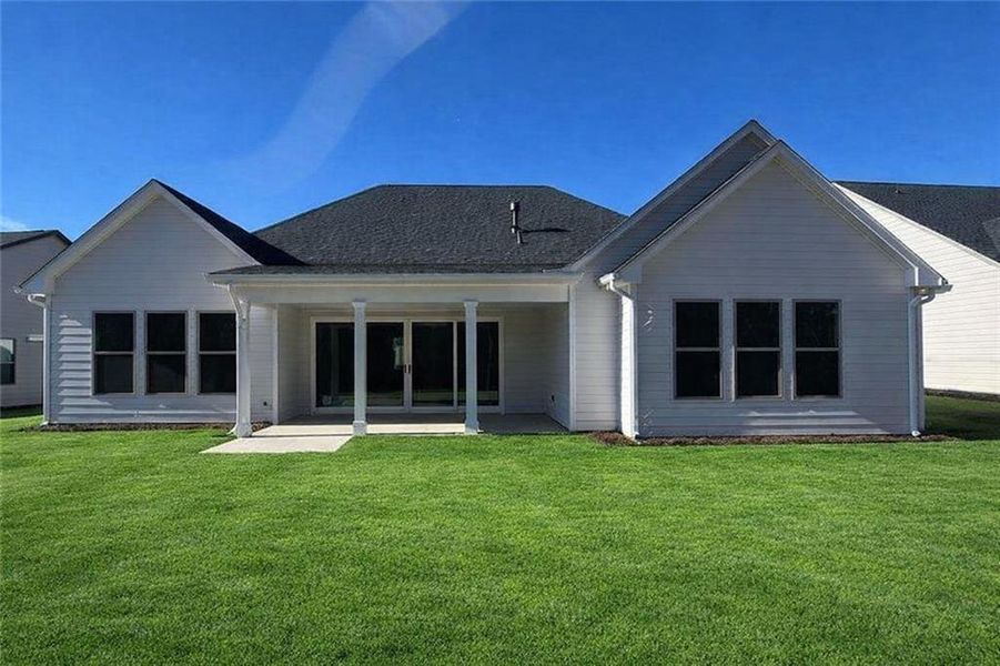 Exterior details and patio area of a home in Soleil Belmont Park, Canton (Image 30).