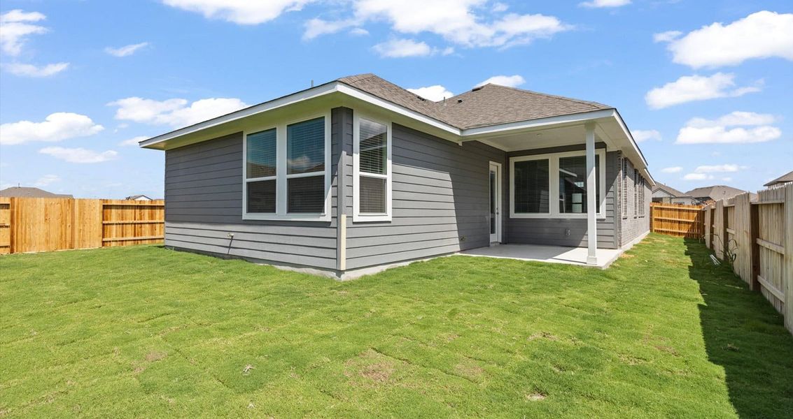 Exterior details and patio area of a home in Village at Three Oaks, Seguin (Image 3). Exterior details and patio area of a home in Village at Three Oaks, Seguin (Image 3).