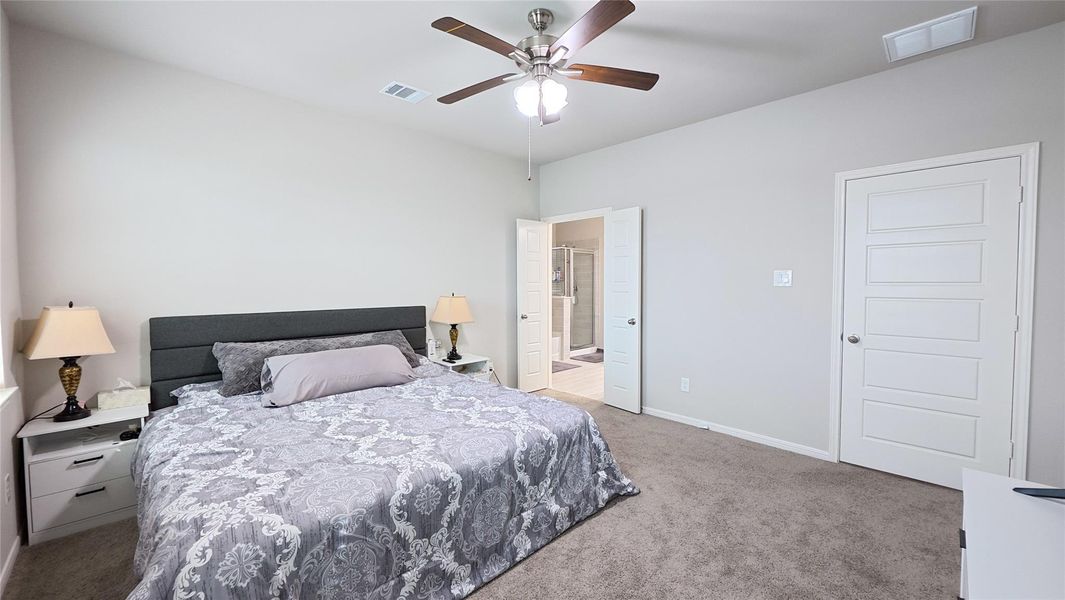 Furnished interior view inside a new home in Sunterra, Katy (Image 10).