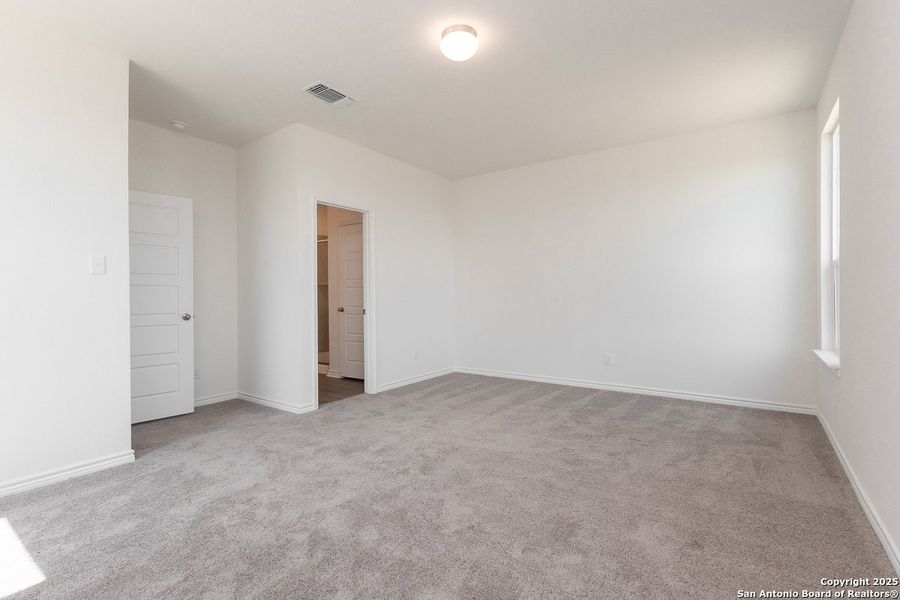 Spacious, unfurnished interior of a new home in Hidden Bluffs at TRP, San Antonio (Image 6).