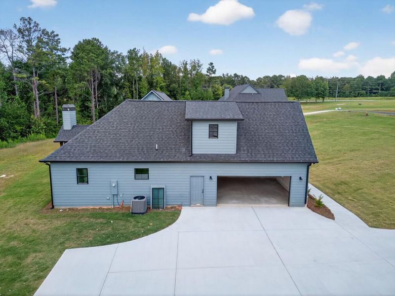 Front exterior of a new home in , Dallas, GA, highlighting curb appeal (Image 22). Front exterior of a new home in , Dallas, GA, highlighting curb appeal (Image 22).