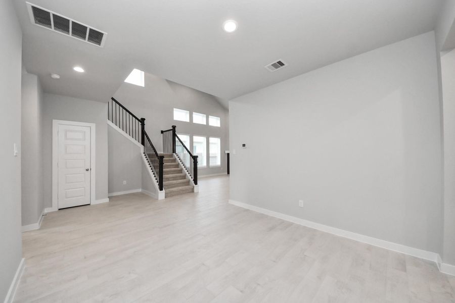 Make memories gathered around the table with your family and friends! This spacious dining room features elegant flooring, custom paint, and adjacent to family room and kitchen for open concept feel.